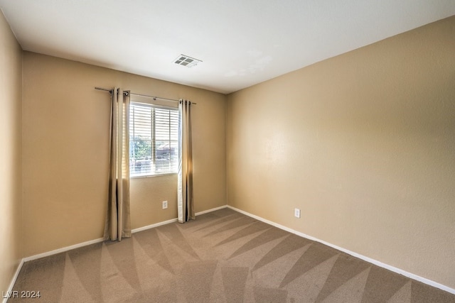 view of carpeted empty room