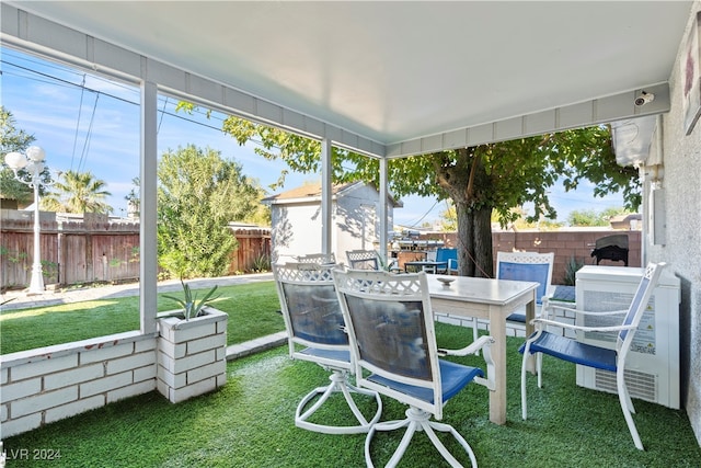 sunroom / solarium featuring a healthy amount of sunlight