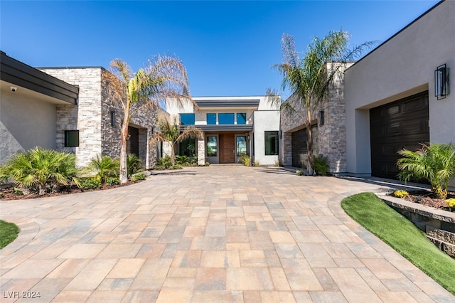 view of front of property featuring a garage