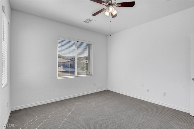 carpeted empty room with ceiling fan