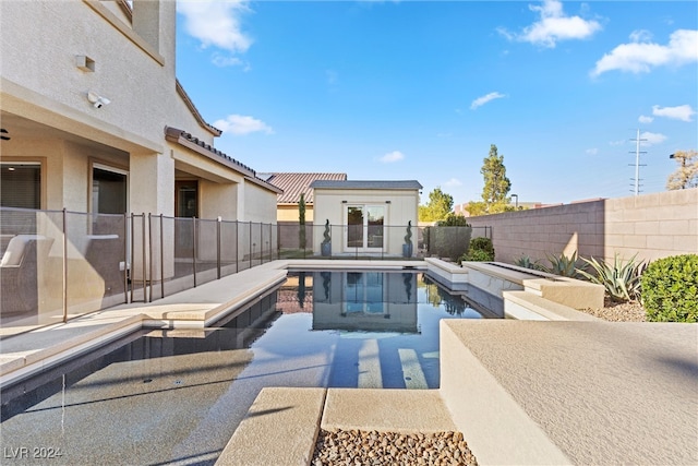 view of swimming pool with a patio