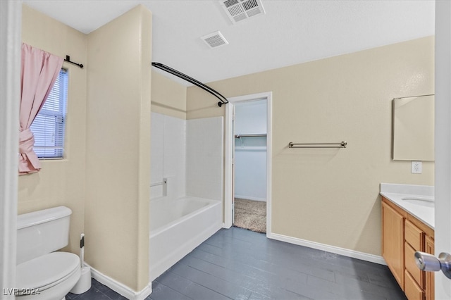 full bathroom featuring bathing tub / shower combination, vanity, toilet, and hardwood / wood-style flooring