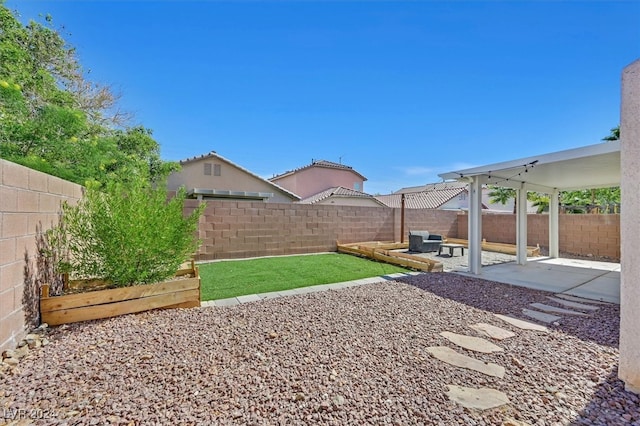 view of yard with a patio area