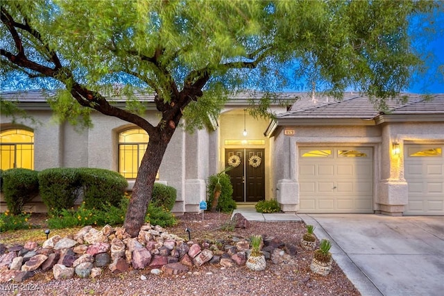 view of front of home featuring a garage