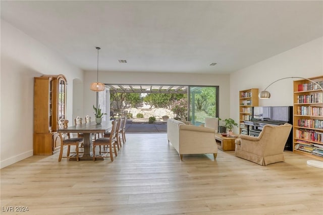 living room with light hardwood / wood-style floors