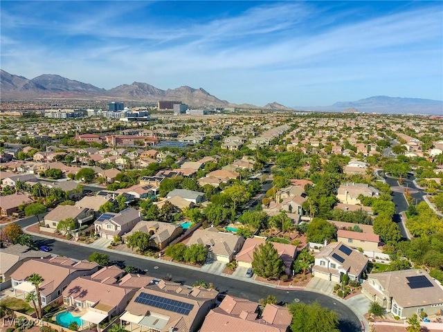 birds eye view of property featuring a mountain view