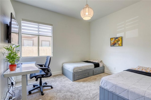 bedroom featuring light colored carpet