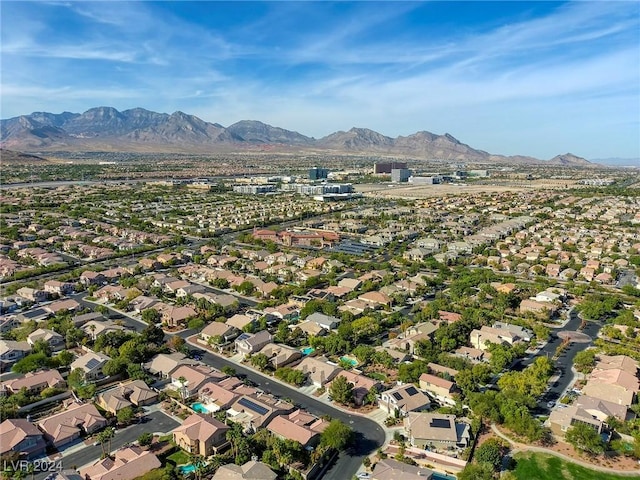 bird's eye view with a mountain view