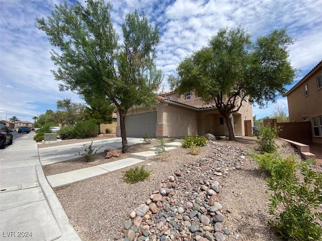 view of front of property featuring a garage