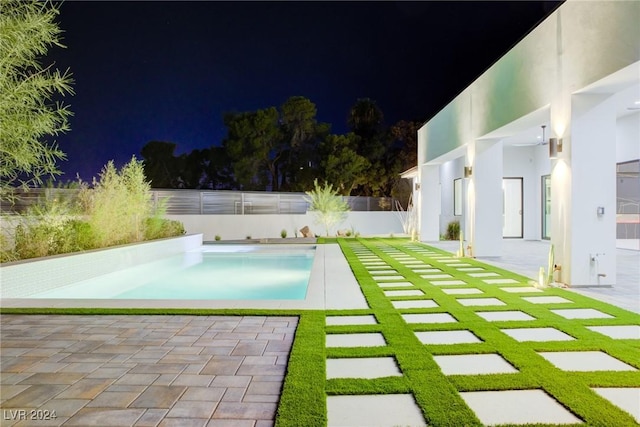 view of pool featuring a fenced in pool, a patio area, and fence