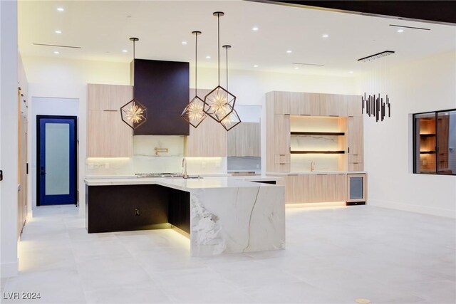 kitchen featuring modern cabinets, open shelves, and light brown cabinetry