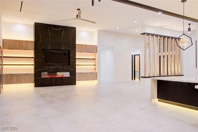 unfurnished living room with recessed lighting