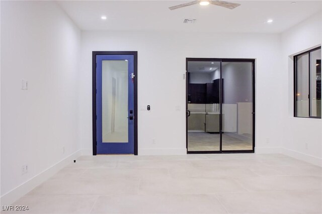 empty room featuring ceiling fan, baseboards, visible vents, and recessed lighting