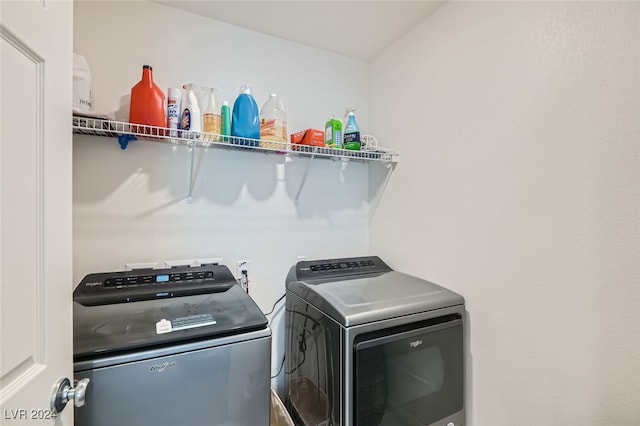 washroom featuring washer and dryer