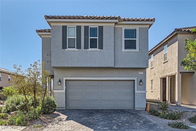 view of front of house with a garage