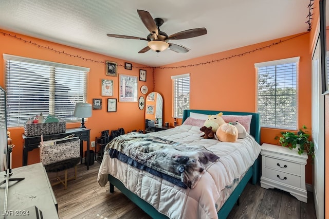 bedroom featuring dark hardwood / wood-style floors and ceiling fan