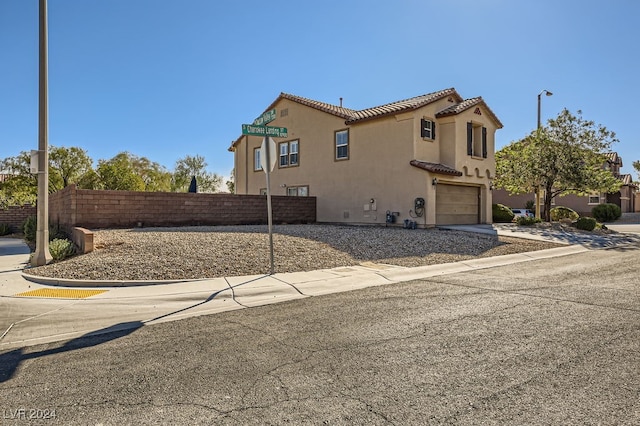 view of home's exterior with a garage