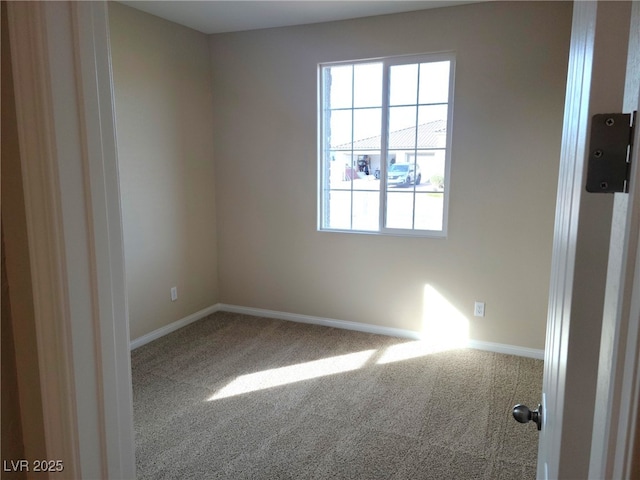 view of carpeted spare room