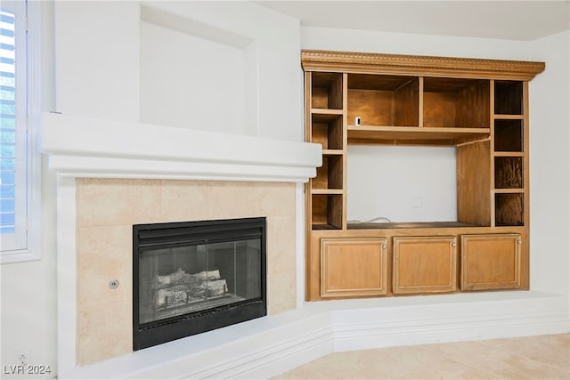 unfurnished living room featuring tile patterned floors