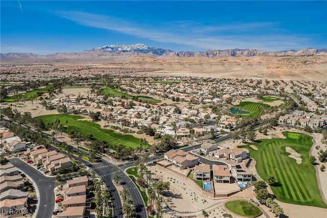 birds eye view of property with a mountain view