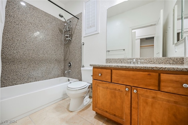 full bathroom with tiled shower / bath, vanity, toilet, and tile patterned floors