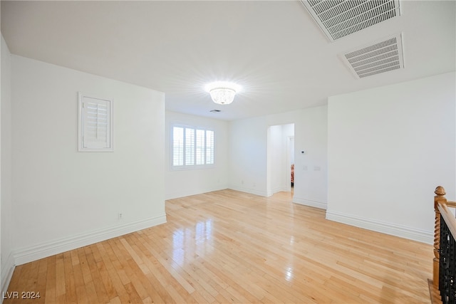 unfurnished room featuring light wood-type flooring