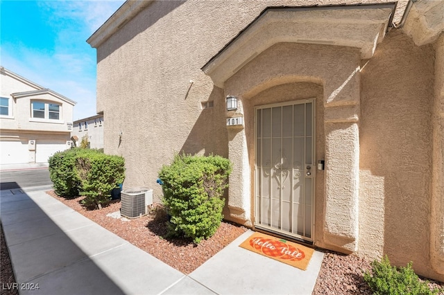 property entrance featuring cooling unit