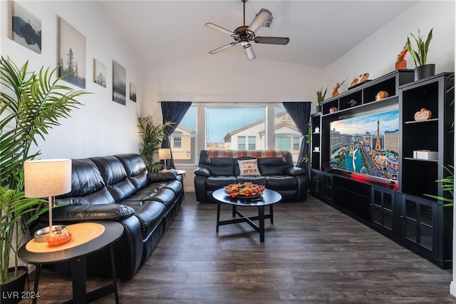 living room featuring vaulted ceiling, ceiling fan, and dark hardwood / wood-style floors