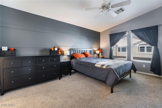 carpeted bedroom featuring ceiling fan and lofted ceiling