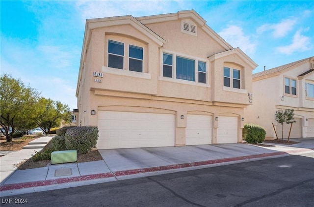 view of property featuring a garage