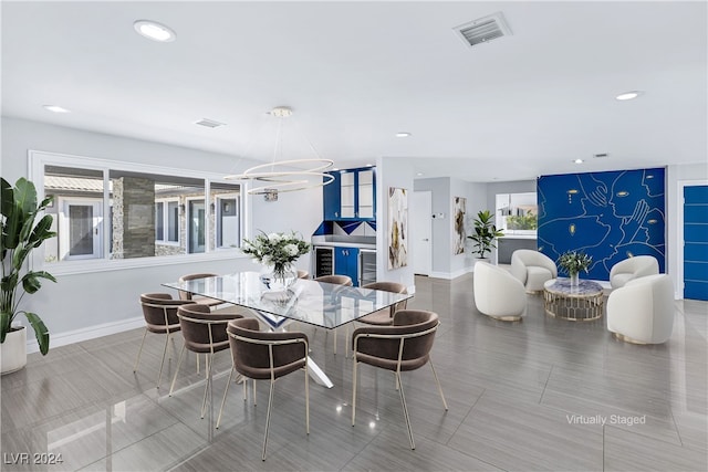 dining room featuring an inviting chandelier and a wealth of natural light