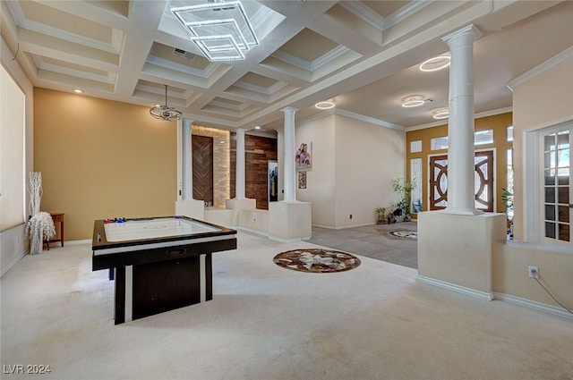 playroom featuring ornate columns, light carpet, coffered ceiling, ornamental molding, and beam ceiling