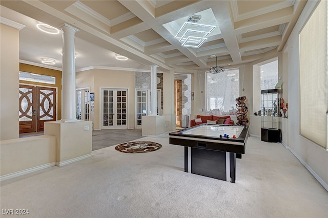 recreation room with french doors, light colored carpet, a notable chandelier, coffered ceiling, and crown molding