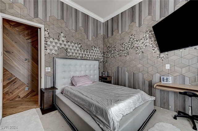 bedroom featuring tile walls and ornamental molding