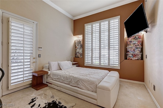 bedroom featuring multiple windows, light carpet, and ornamental molding