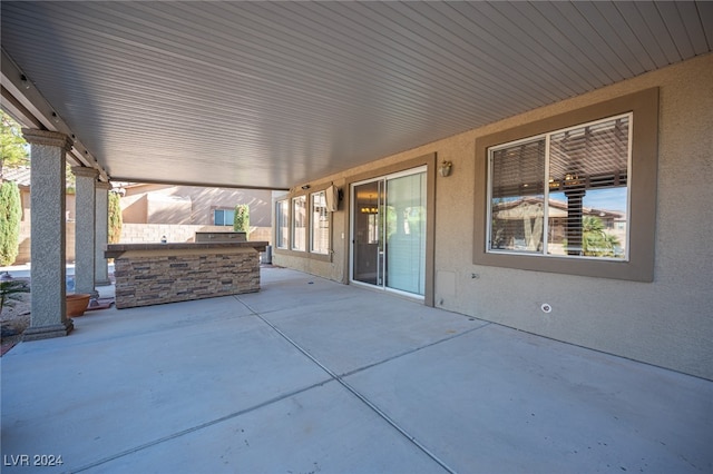 view of patio / terrace featuring exterior kitchen