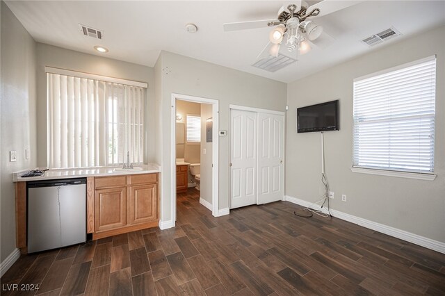 kitchen featuring sink, dishwasher, dark hardwood / wood-style floors, and ceiling fan