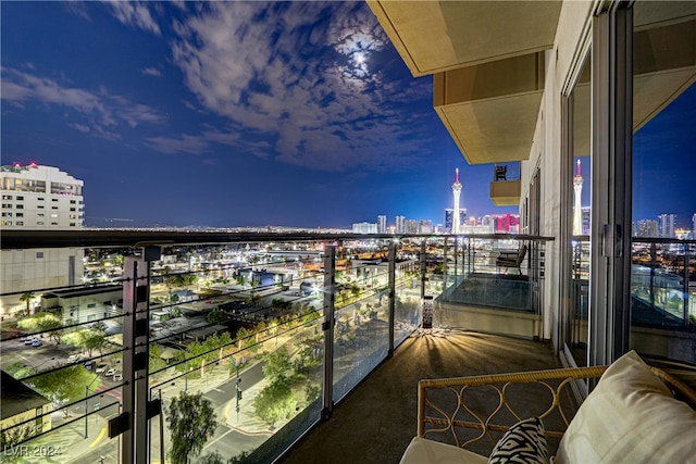 view of balcony at dusk