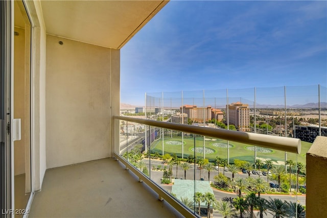 balcony featuring a mountain view