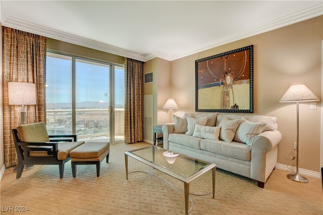 living room featuring ornamental molding and a healthy amount of sunlight