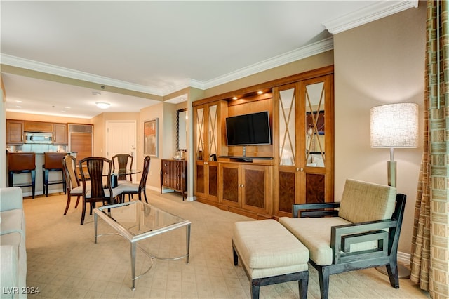 living room featuring crown molding