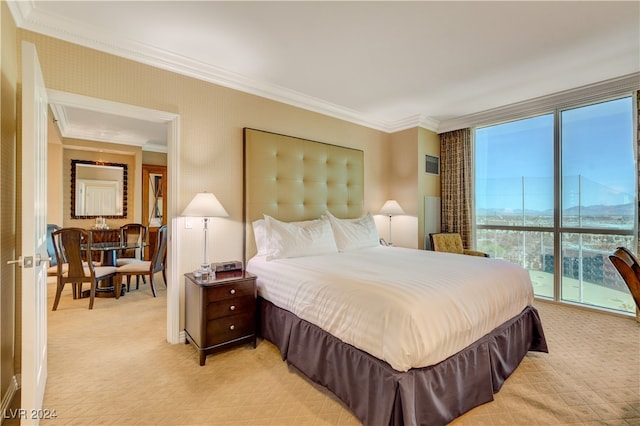 bedroom featuring crown molding and multiple windows