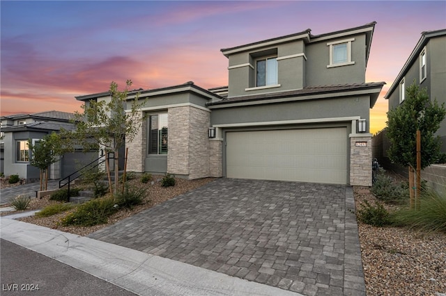 view of front of property with a garage