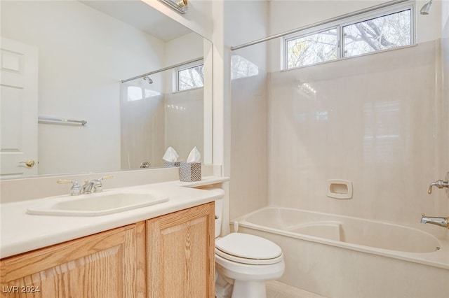 full bathroom featuring shower / washtub combination, vanity, and toilet