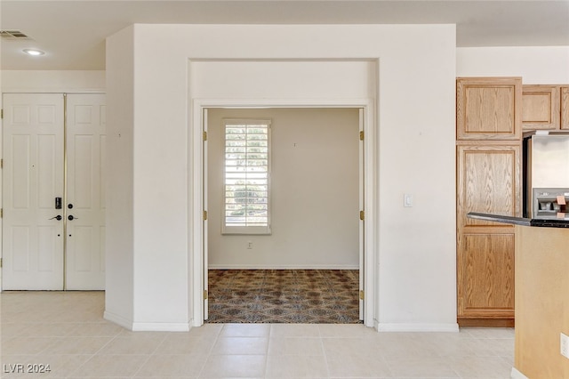 view of tiled foyer entrance