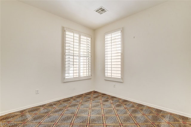 unfurnished room with carpet