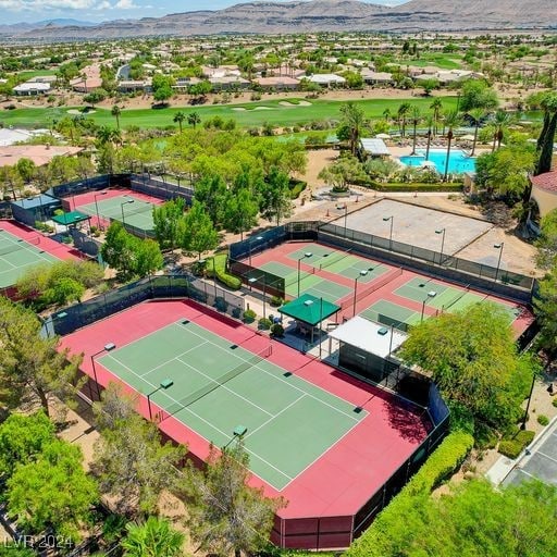 birds eye view of property featuring a mountain view