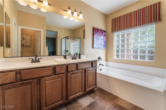 bathroom featuring independent shower and bath and vanity