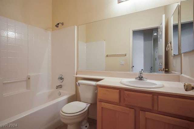 full bathroom with shower / tub combination, vanity, and toilet