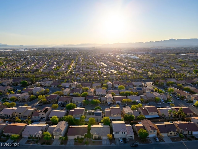 aerial view at dusk with a mountain view